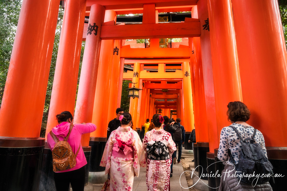 Kyoto People dressed up in yokata visit Senbon Torii (Thousand Torii Gates) Fushimi Inari Shrine